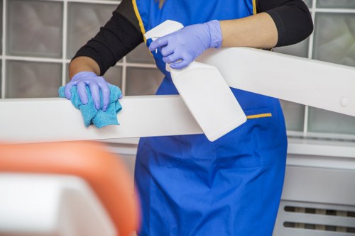 Technician treating carpet stains in a Kentishtown property